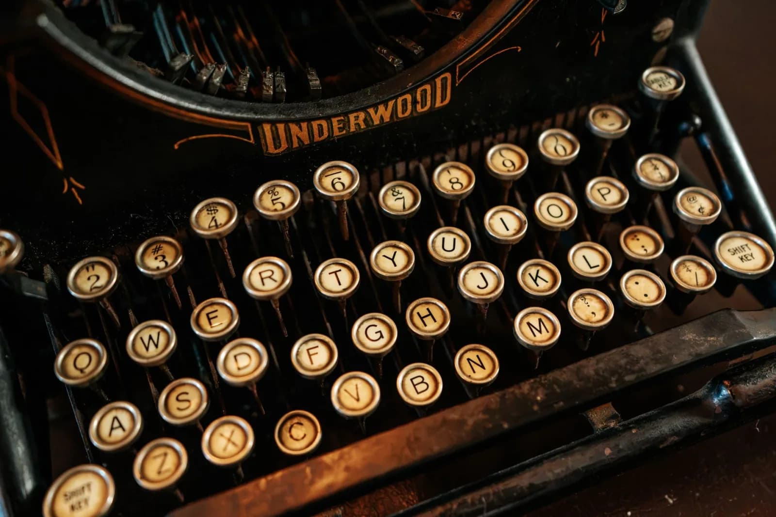 Close-up image of retro Underwood typewriter keys with a nostalgic and classic feel.