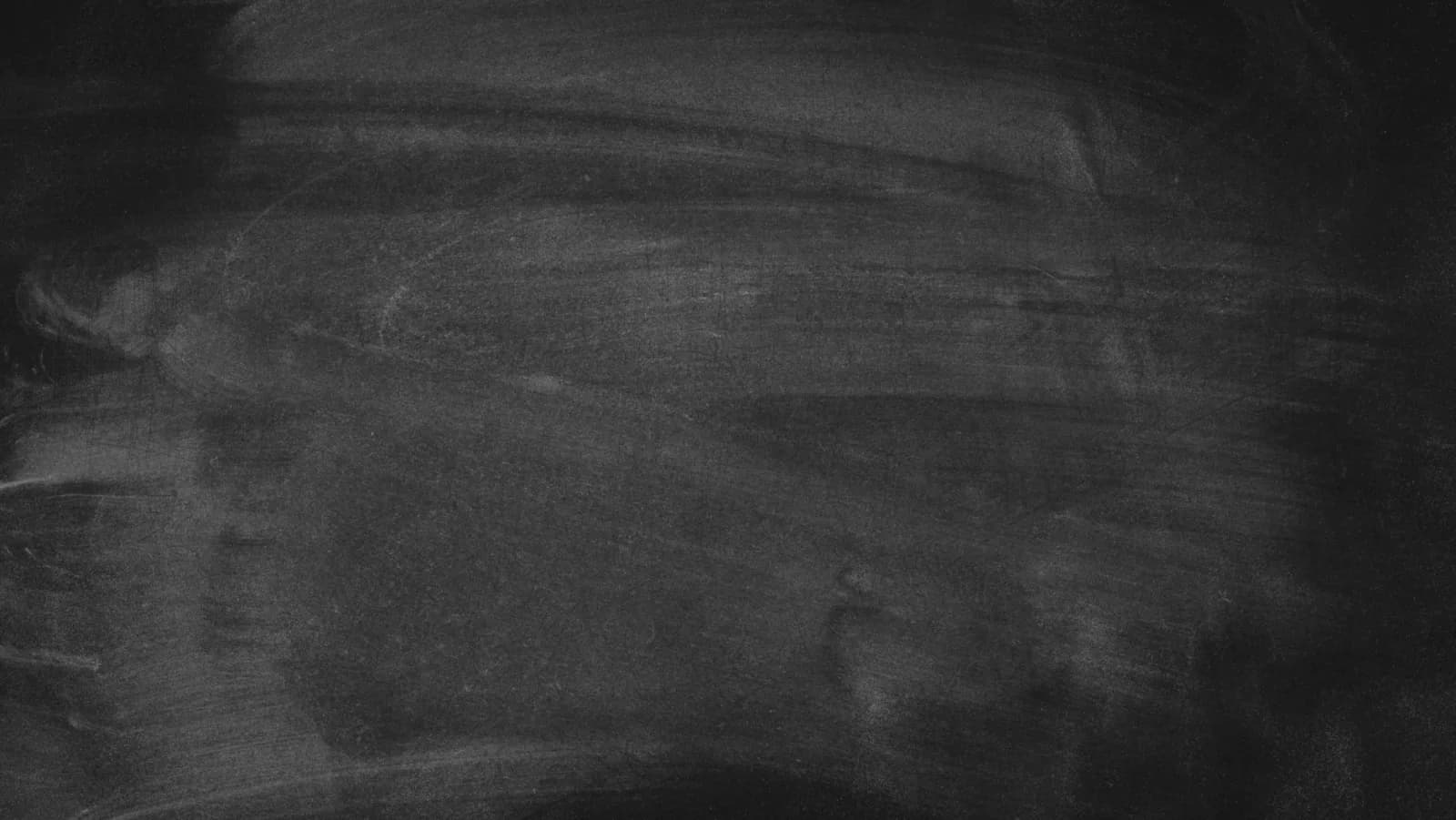 Dark textured chalkboard background suitable for design or educational content.