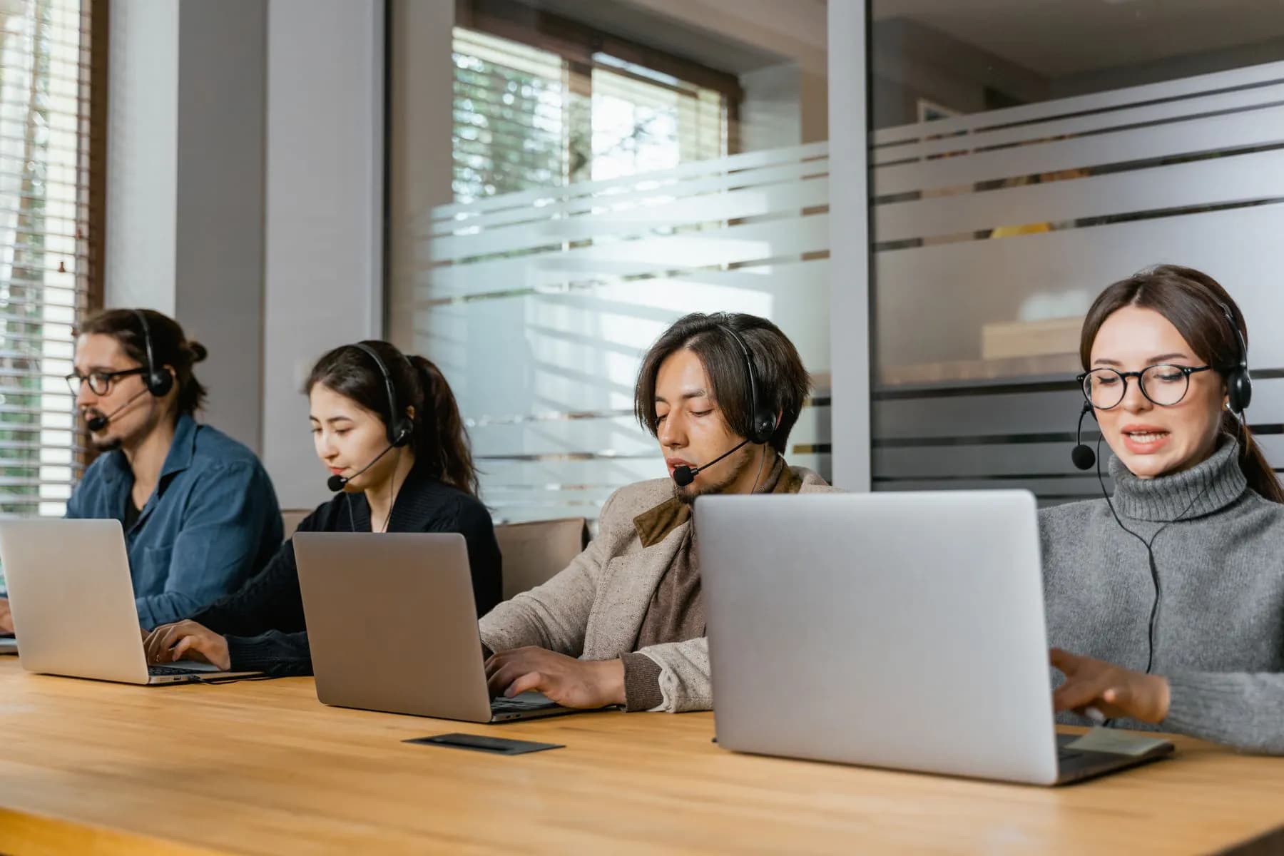 A customer support team working in their subscription software